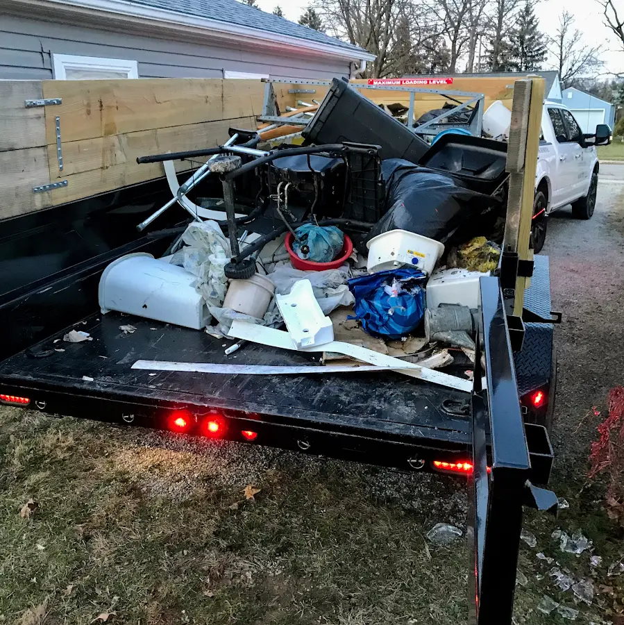 Roll-off dumpster delivered to a residential driveway in Rossville